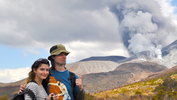 Our classic Tongariro Alpine Crossing volcano eruption vacation photo. Still crazy to think we had just been hiking right at that spot a short while before. Thanks for the amazing adventures and memories, New Zealand.